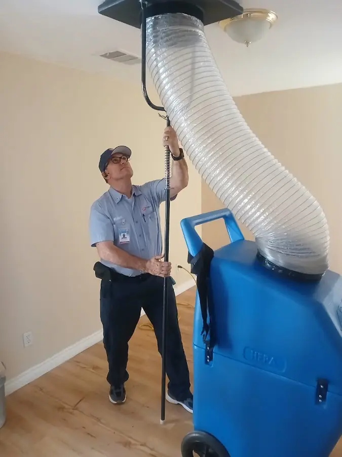 Mini Split Installation technician using HEPA equipment in Holly Springs